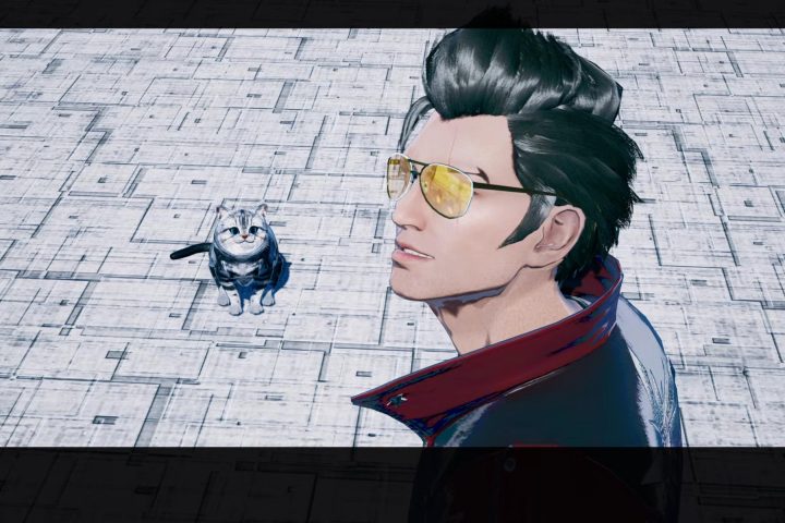 A screenshot from No More Heroes III. Travis stands in the foreground, seen from the shoulders up. He's looking to the top left. Next to him is a small tabby cat.