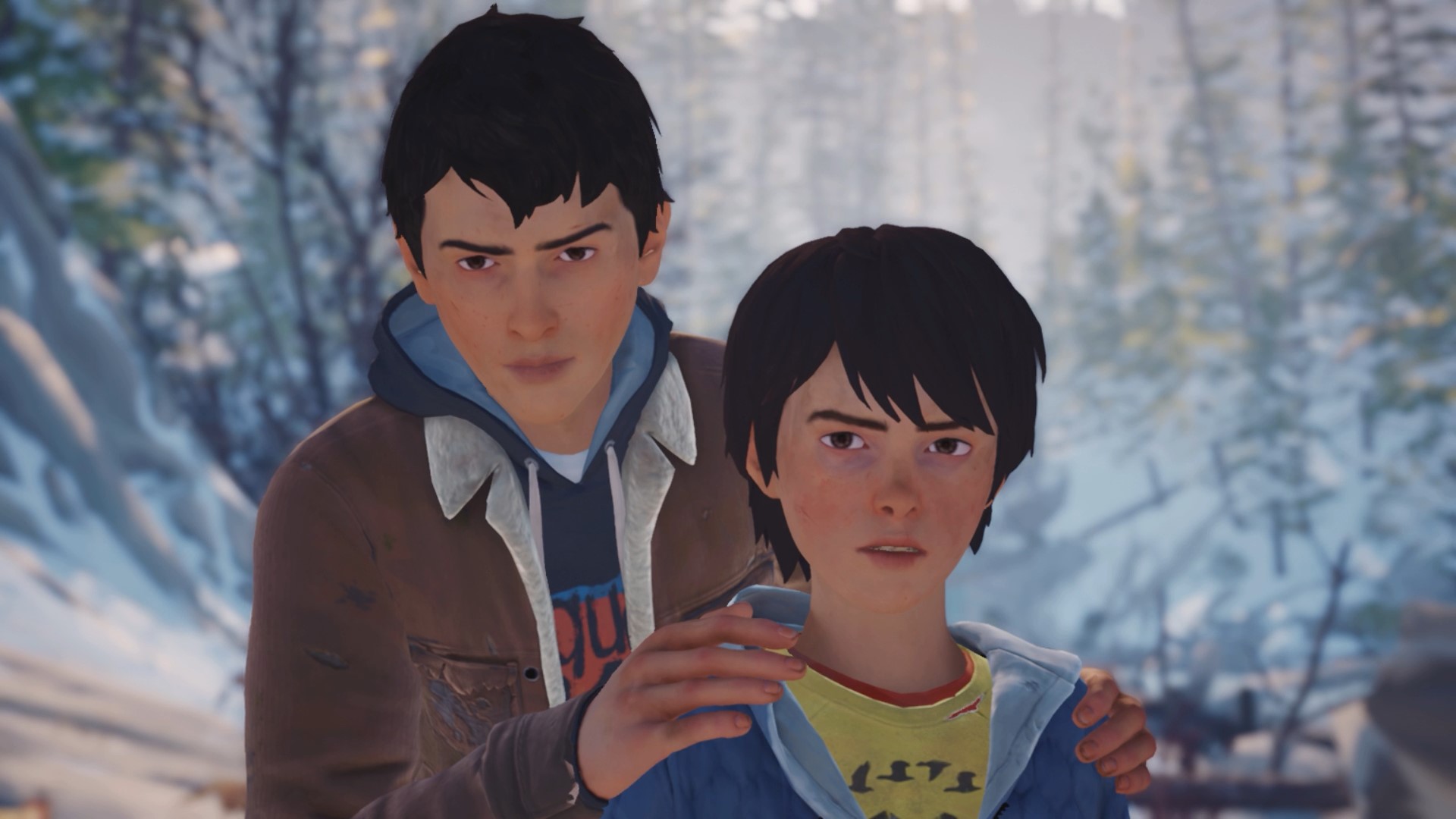 A screenshot from Life is Strange 2 on Nintendo Switch. Sean is standing on the left, with his hands on Daniel's (he's on the left) shoulders.
