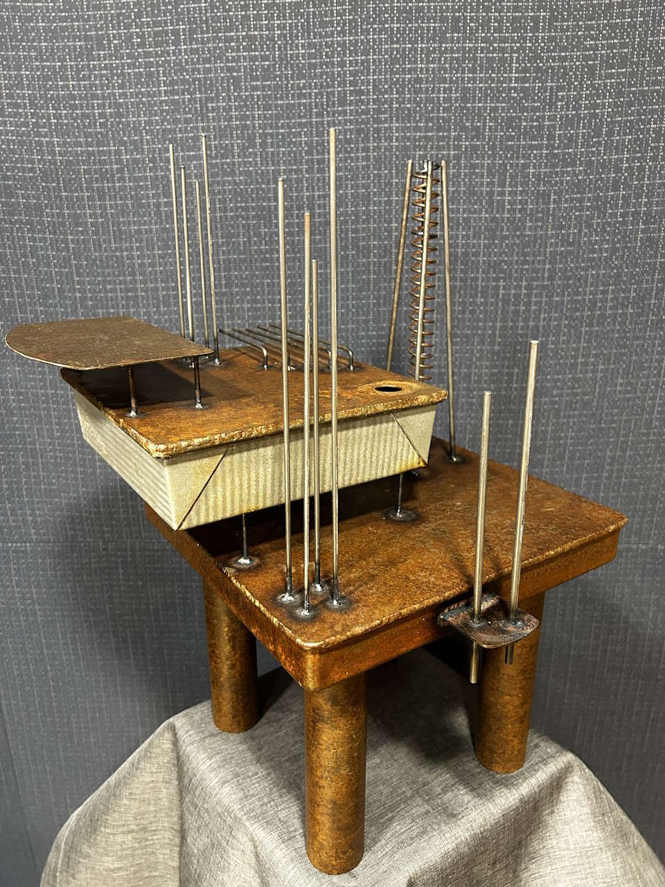 A bespoke metal instrument known as The Rig, created to score Still Wakes the Deep.