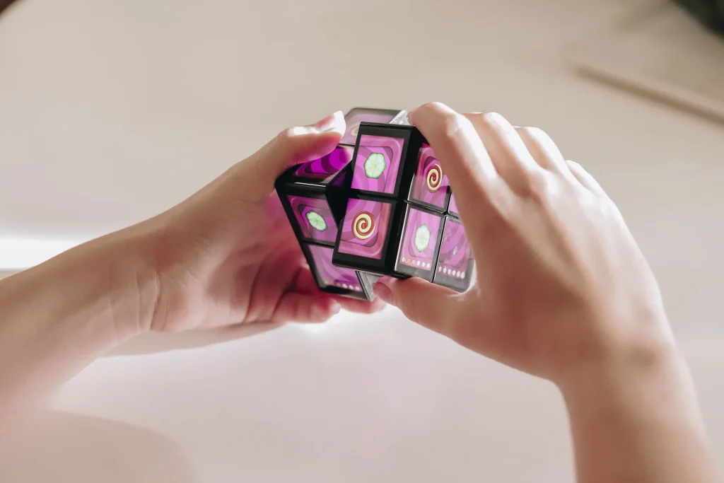 A photo of Rubik's WOWCube in use.