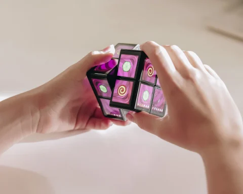 A photo of Rubik's WOWCube in use.